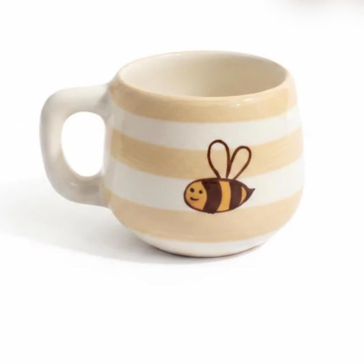 A striped ceramic mug with a bee design, shown on an Etsy product page with price and payment options visible.