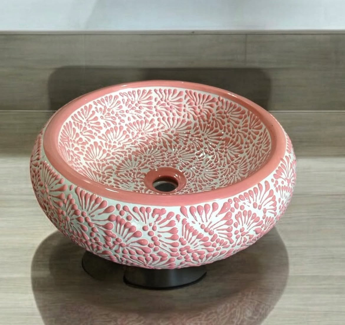 Handcrafted pink Mexican pottery sink, perfect for adding a bold, colorful touch to any bathroom or kitchen.