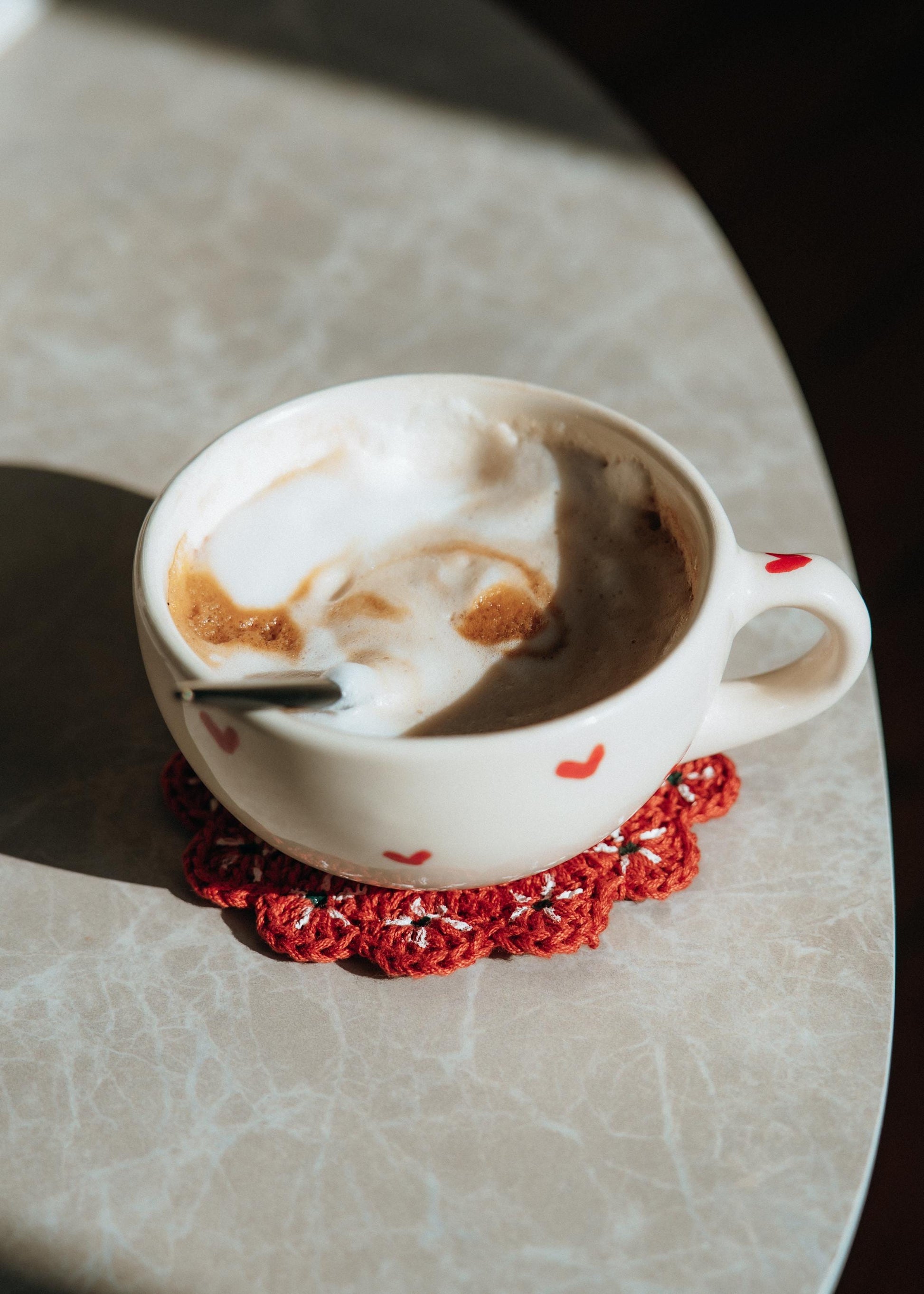 Latina owned handmade drinkware with crochet detail, cozy kitchen vibe.
