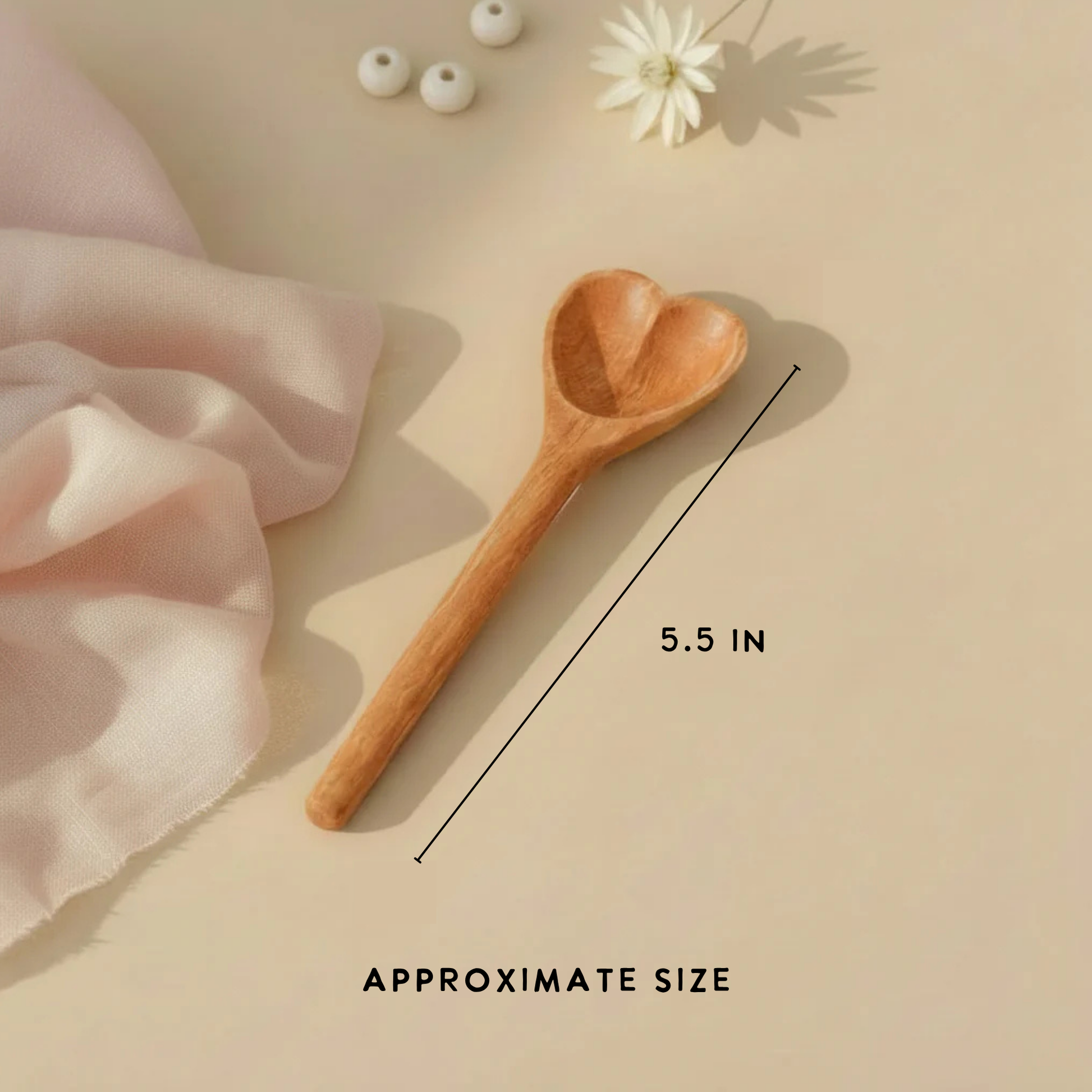 Wooden spoon with measurement label on a beige background